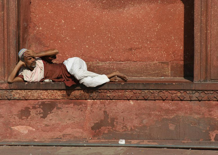 Мусульманин на площади Джама Масджид в Дели, Индия